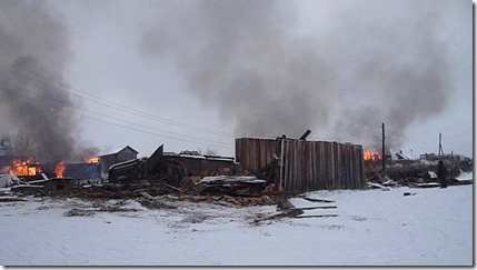 Сожжение ангарского поселка Болтурино, оказавшегося в зоне затопления Богучанской ГЭС. Фото: Валентина Семенова