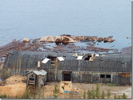 Брошенная лесопилка в зоне затопления Богучанской ГЭС. Фото: Евгений Болмасов